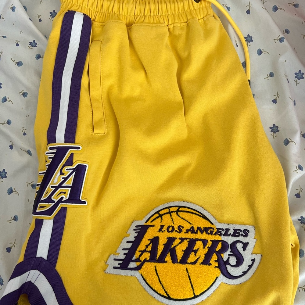 Men standard pro laker shorts xl. Gently used